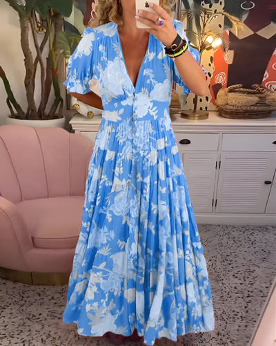 Clara | Kleid mit V-Ausschnitt und fröhlichem Blumendruck